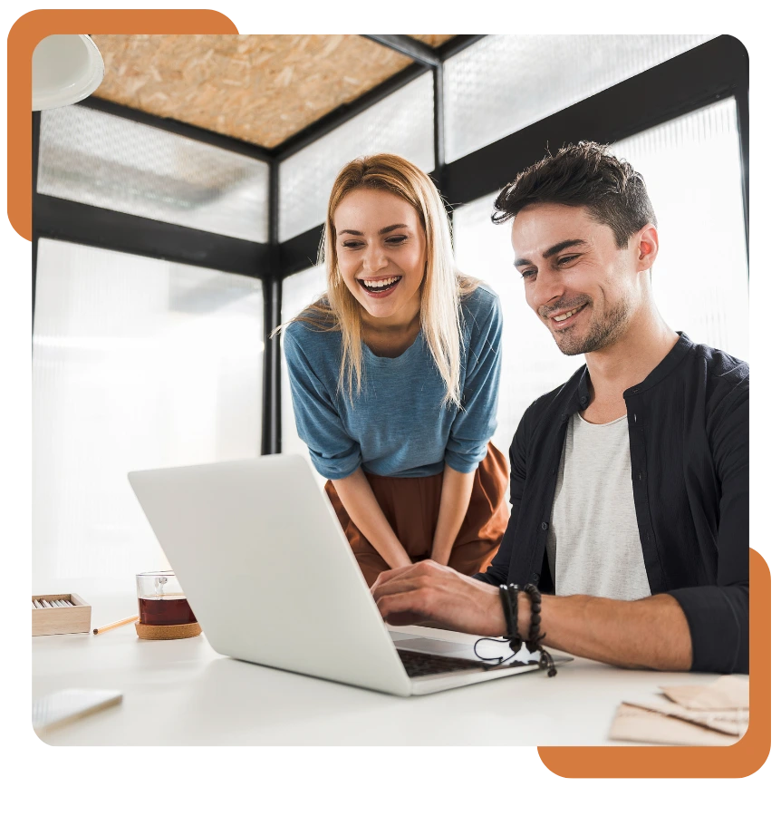 two people looking at the laptop about trade finance